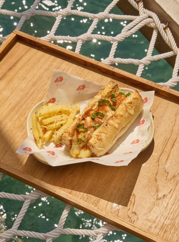 Elegant beachfront dining at Le Bajo Flores restaurant in Labuan Bajo, Indonesia