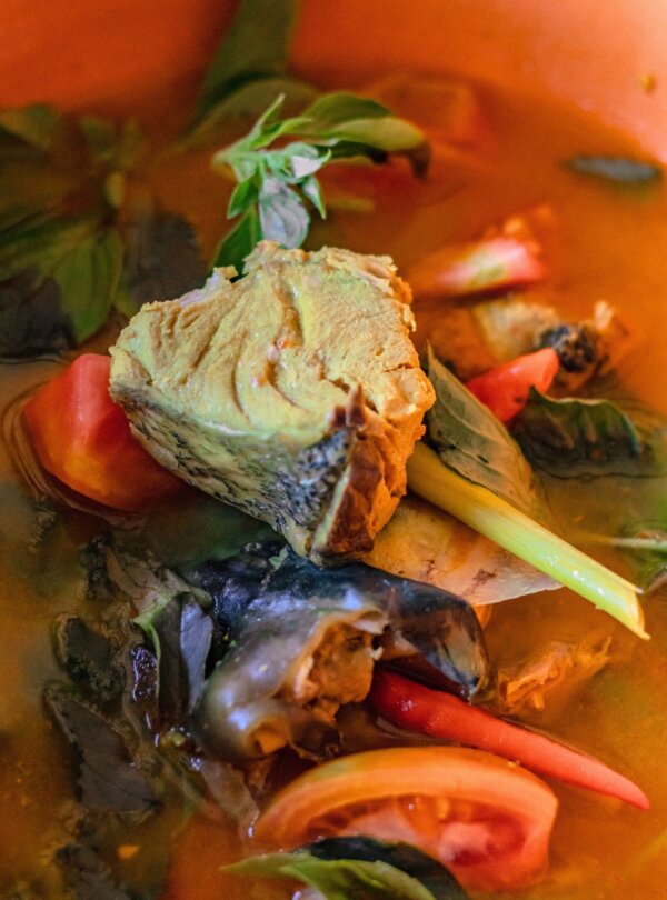 Cozy dining area of Artomoro Restaurant serving Indonesian and seafood specialties in Labuan Bajo, Flores