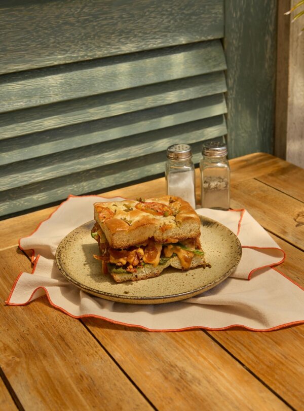 Elegant beachfront dining at Le Bajo Flores restaurant in Labuan Bajo, Indonesia